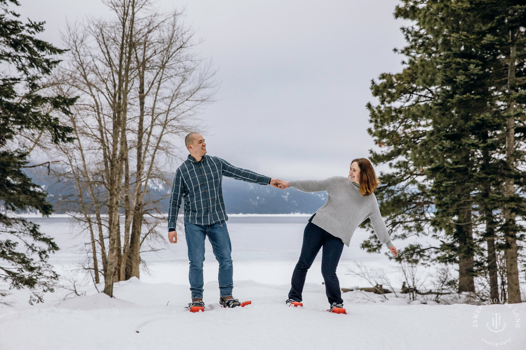 Cascade Mountain snowshoeing adventure engagement session in the snow by Snoqualmie wedding photographer James Thomas Long Photography