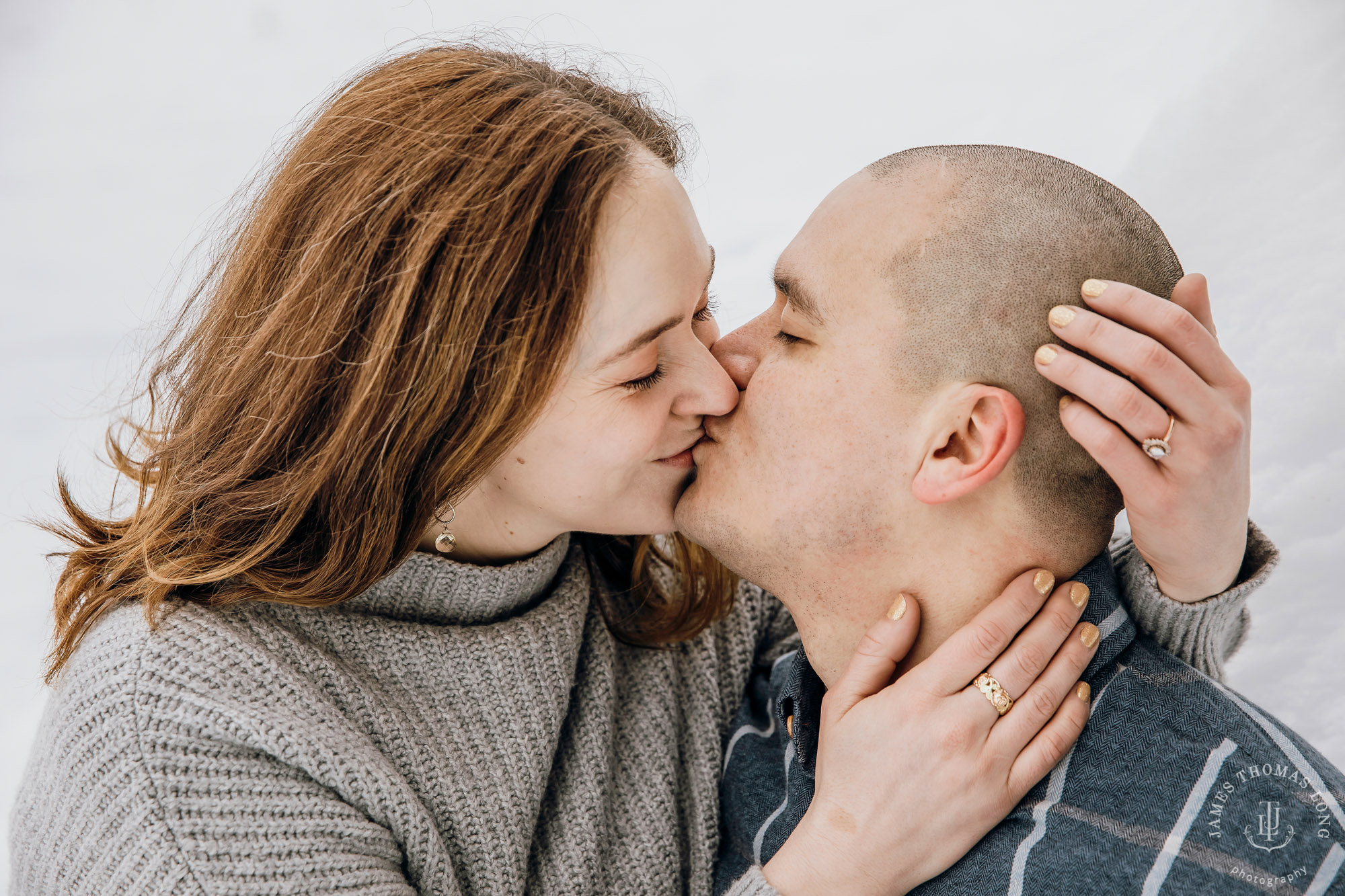 Cascade Mountain snowshoeing adventure engagement session in the snow by Snoqualmie wedding photographer James Thomas Long Photography