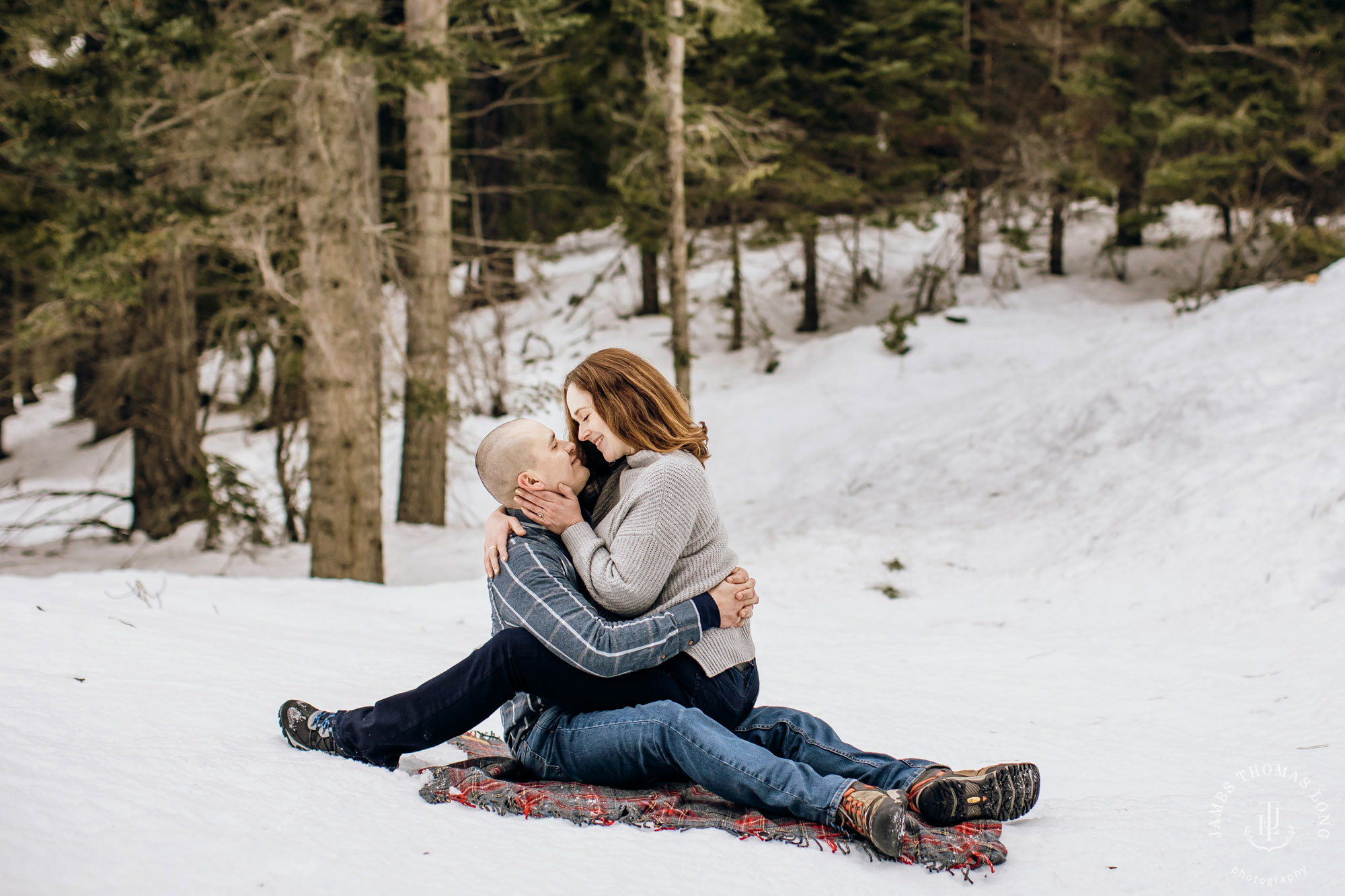 Cascade Mountain snowshoeing adventure engagement session in the snow by Snoqualmie wedding photographer James Thomas Long Photography