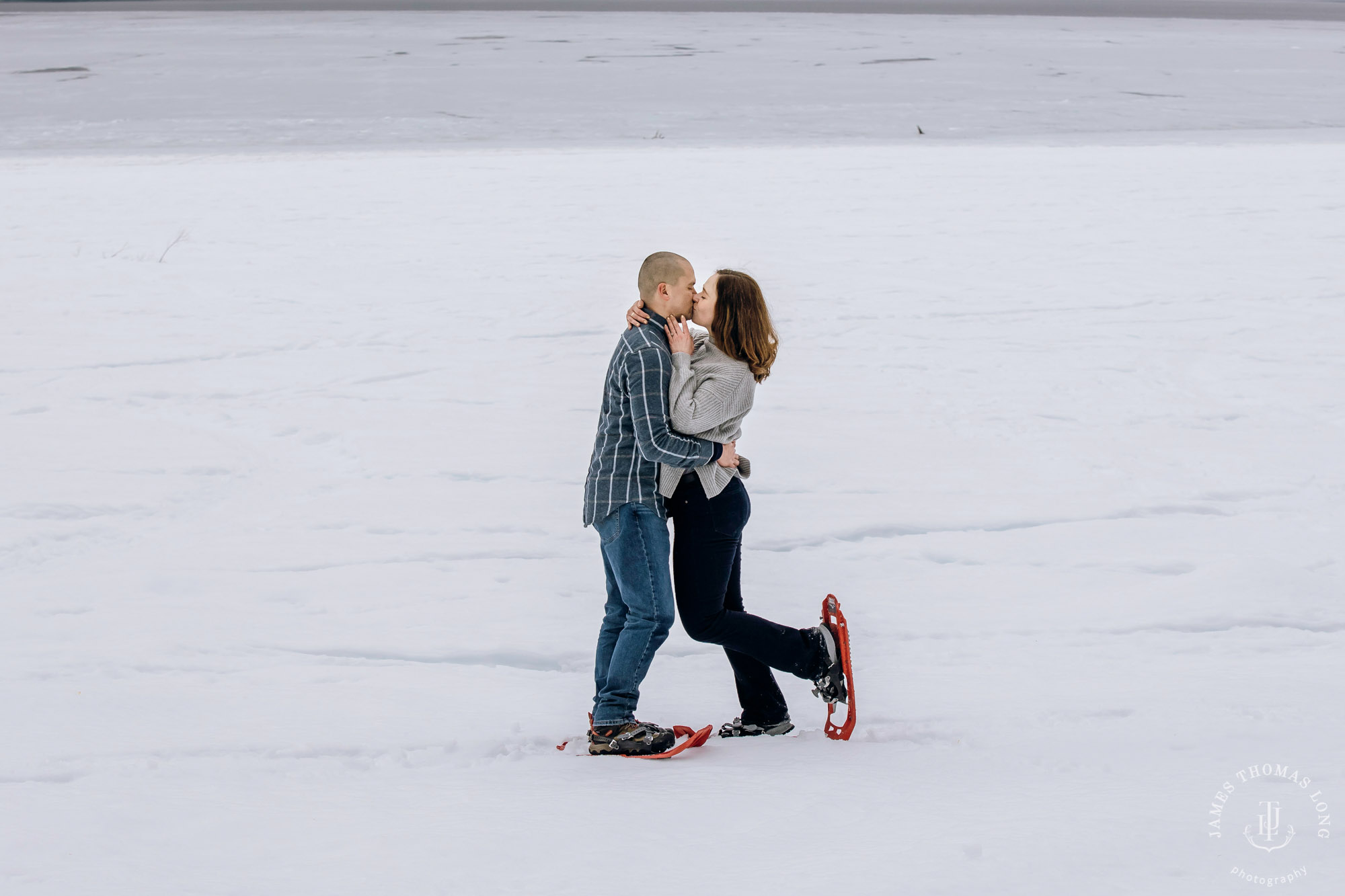 Cascade Mountain snowshoeing adventure engagement session in the snow by Snoqualmie wedding photographer James Thomas Long Photography