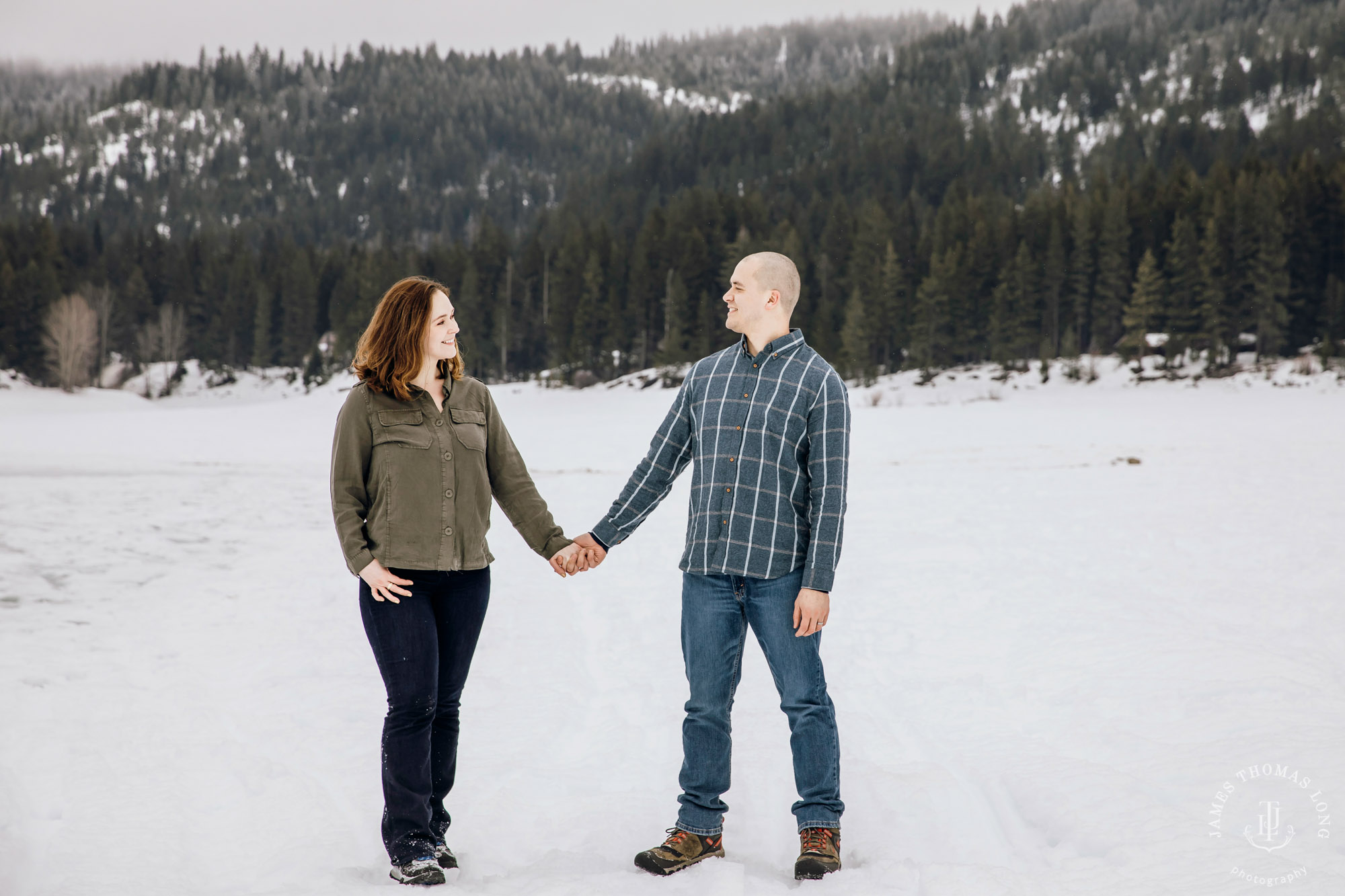 Cascade Mountain snowshoeing adventure engagement session in the snow by Snoqualmie wedding photographer James Thomas Long Photography