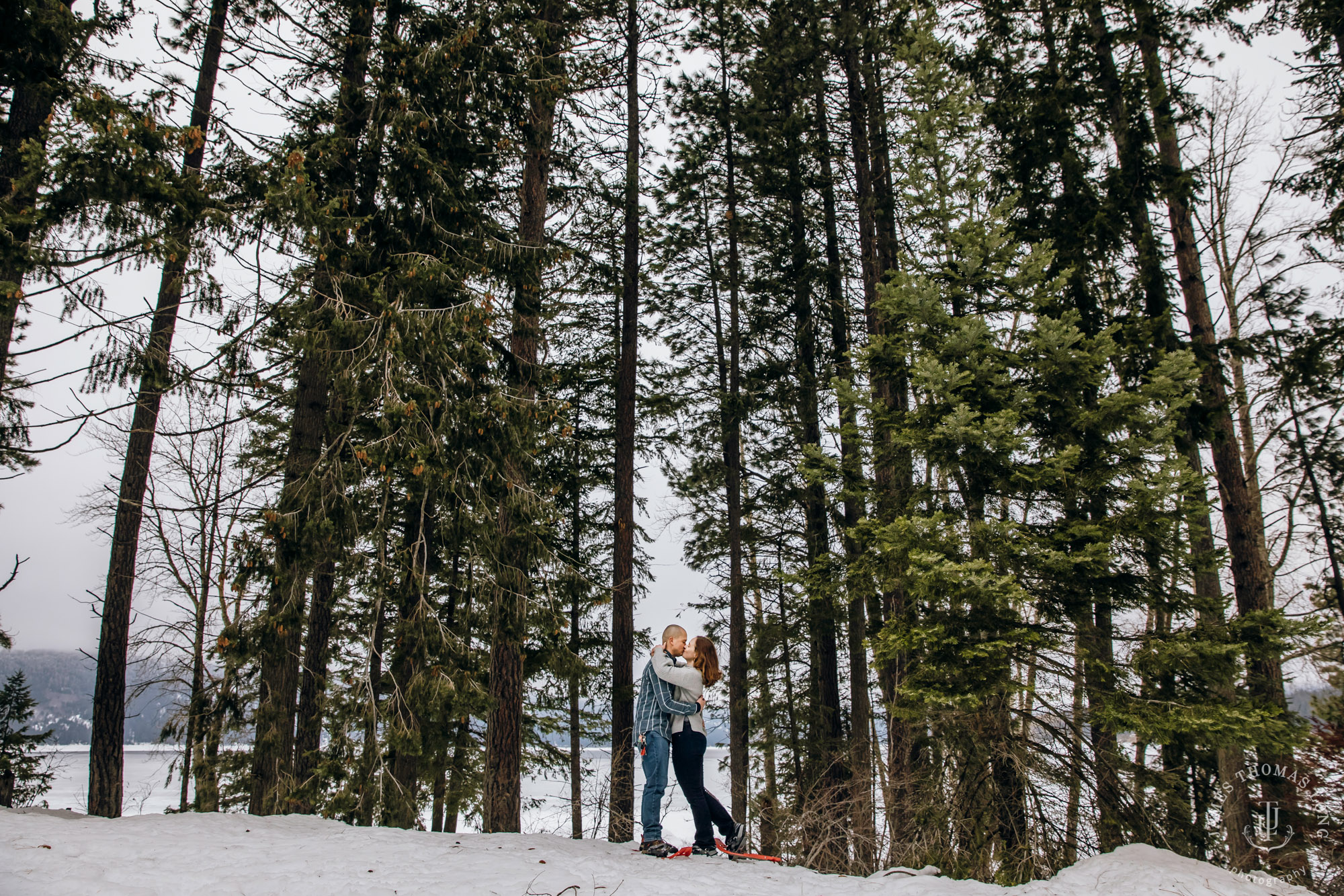 Cascade Mountain snowshoeing adventure engagement session in the snow by Snoqualmie wedding photographer James Thomas Long Photography