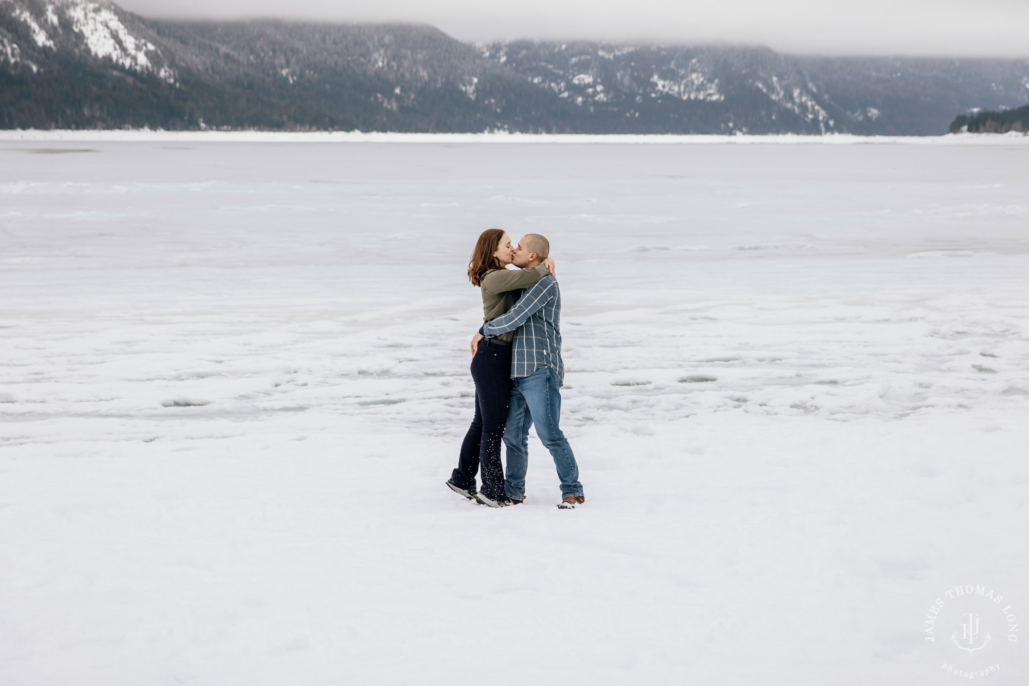 Cascade Mountain snowshoeing adventure engagement session in the snow by Snoqualmie wedding photographer James Thomas Long Photography