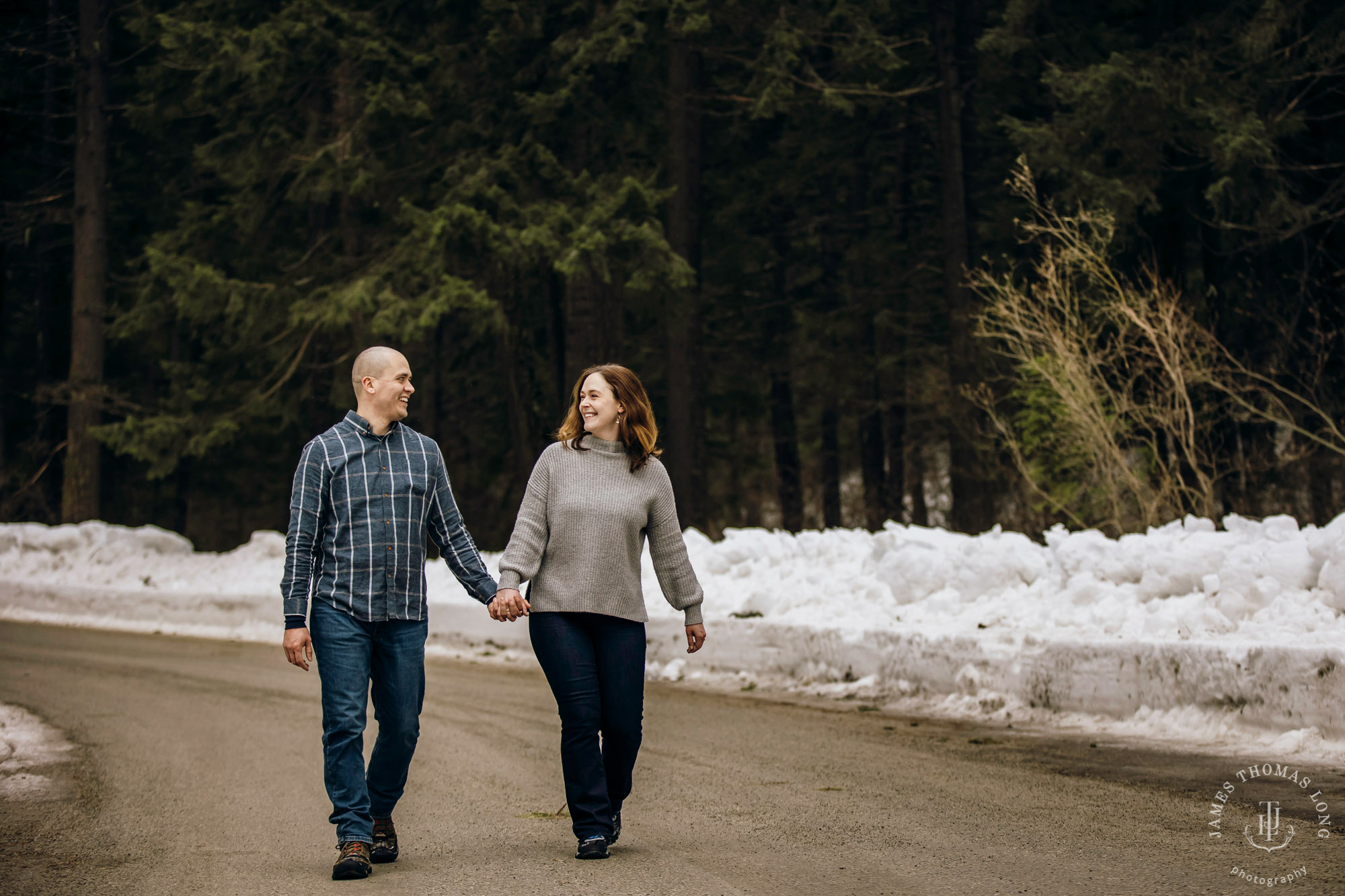 Cascade Mountain snowshoeing adventure engagement session in the snow by Snoqualmie wedding photographer James Thomas Long Photography