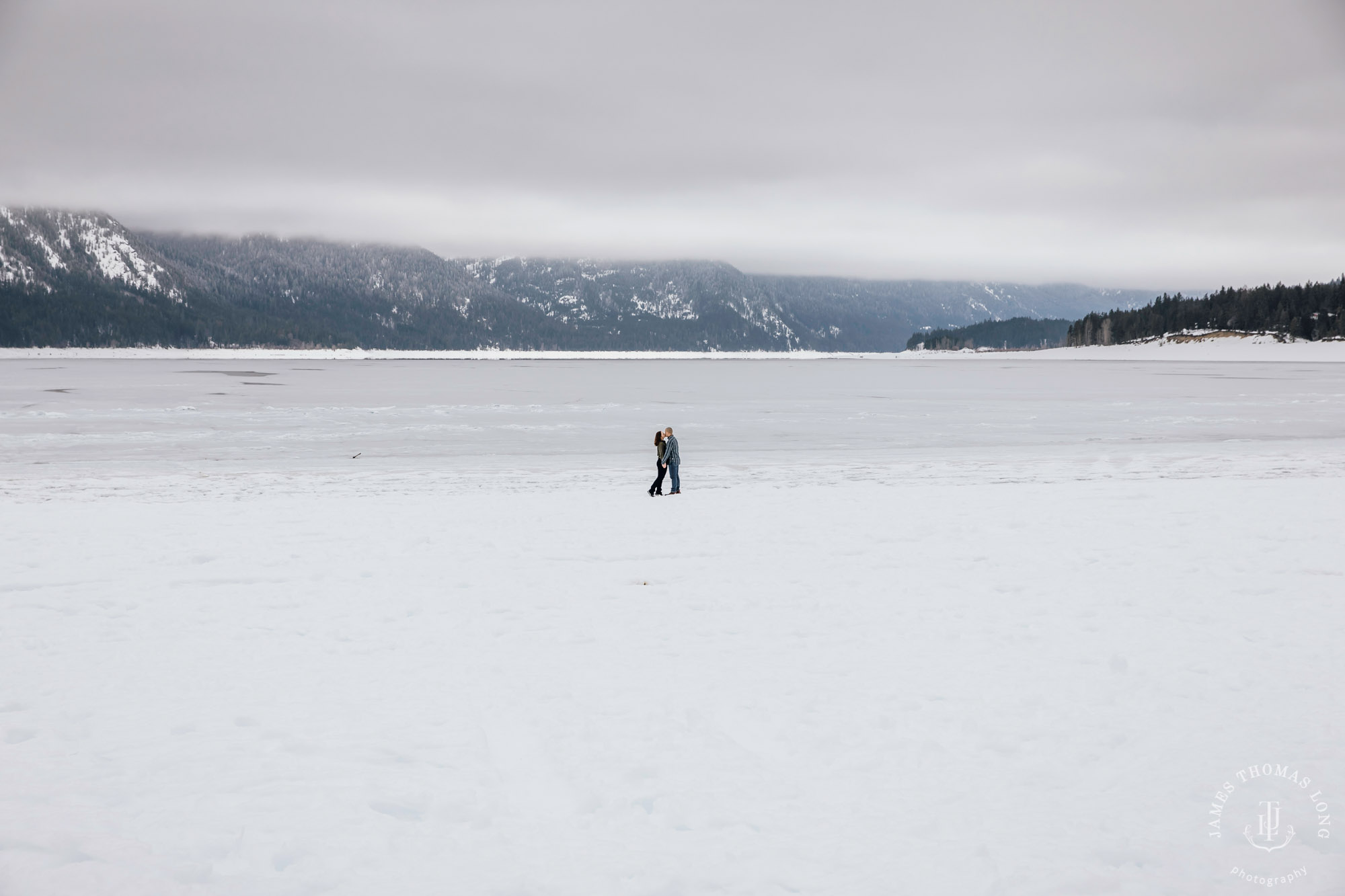 Cascade Mountain snowshoeing adventure engagement session in the snow by Snoqualmie wedding photographer James Thomas Long Photography