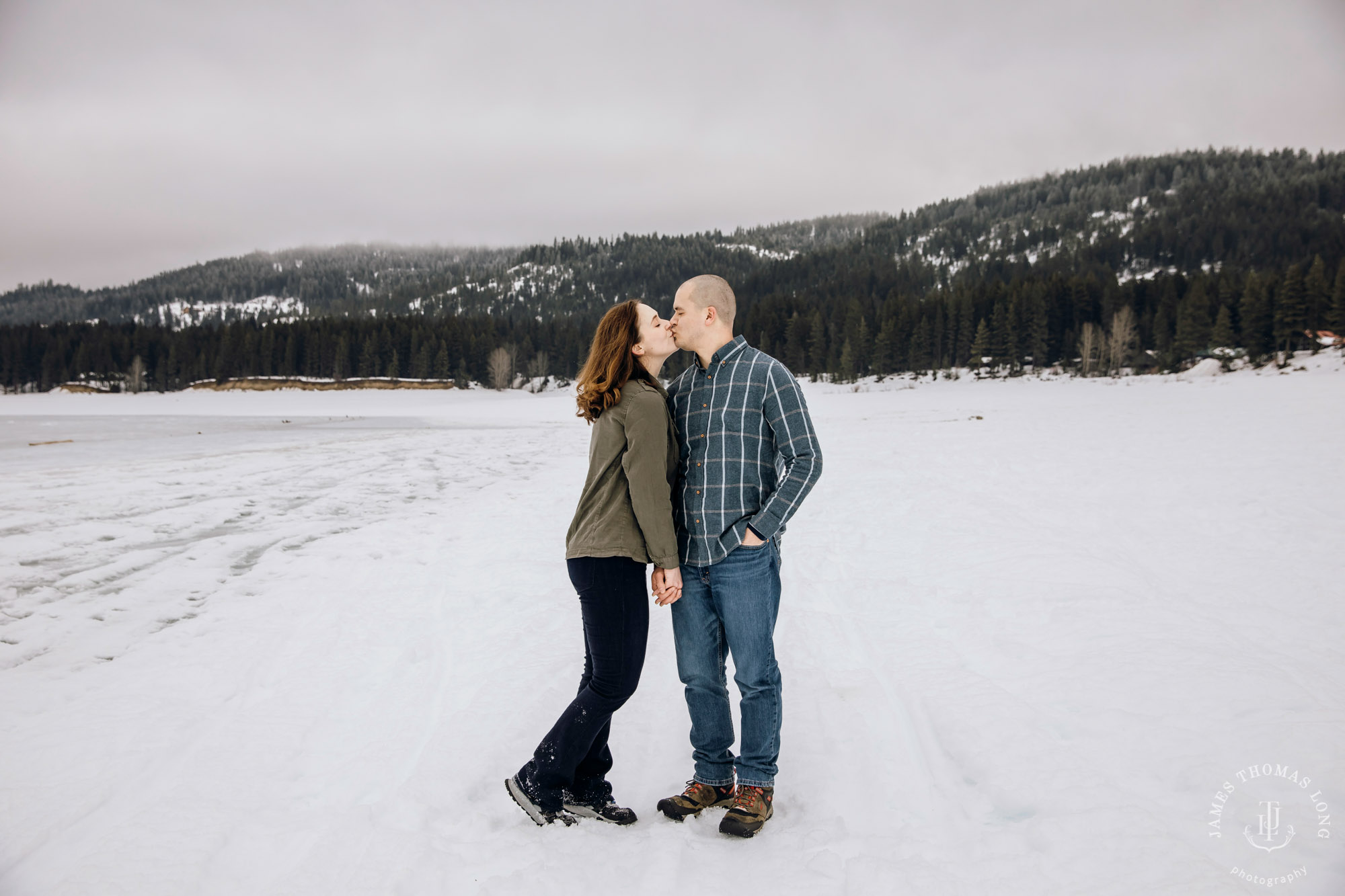 Cascade Mountain snowshoeing adventure engagement session in the snow by Snoqualmie wedding photographer James Thomas Long Photography