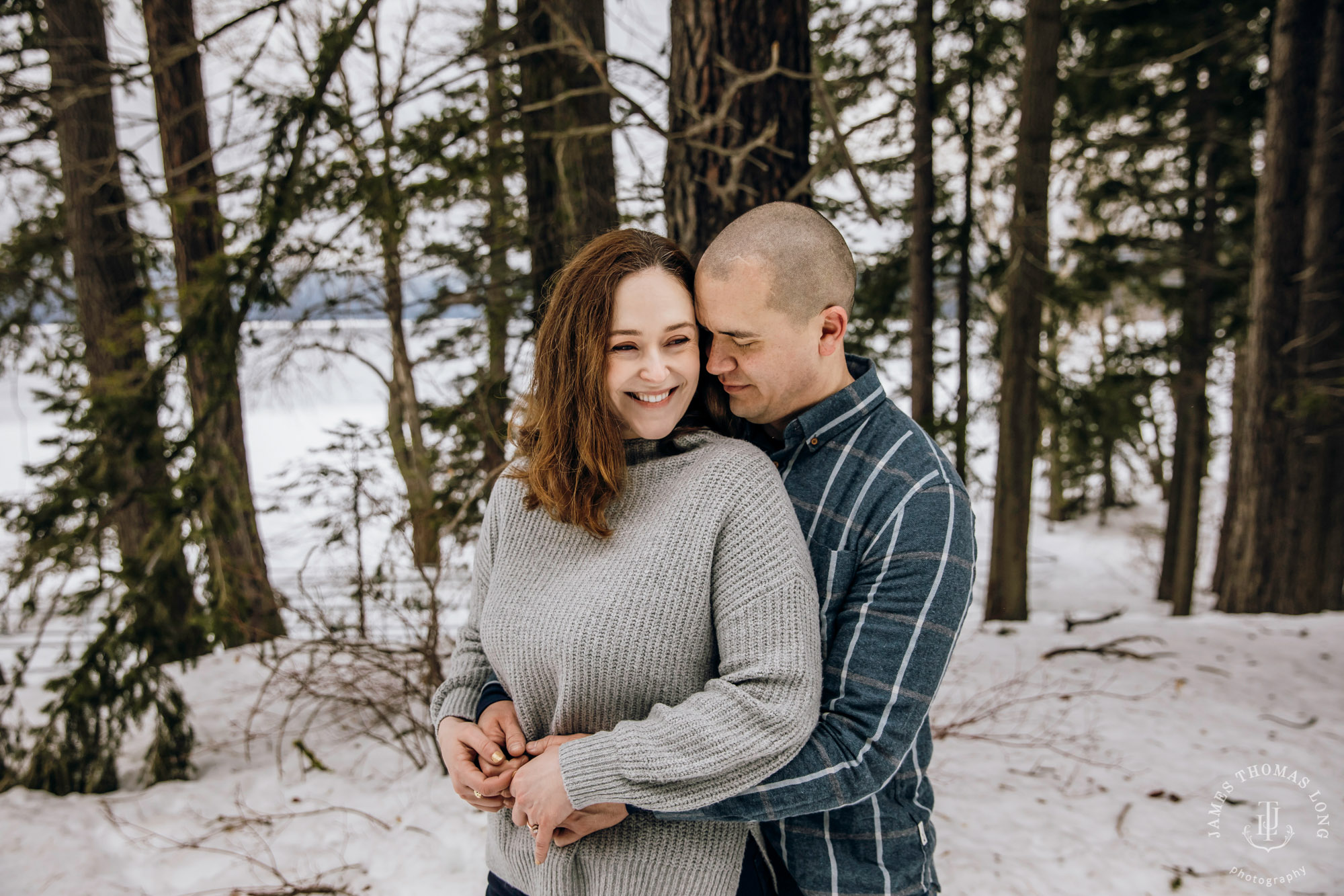 Cascade Mountain snowshoeing adventure engagement session in the snow by Snoqualmie wedding photographer James Thomas Long Photography