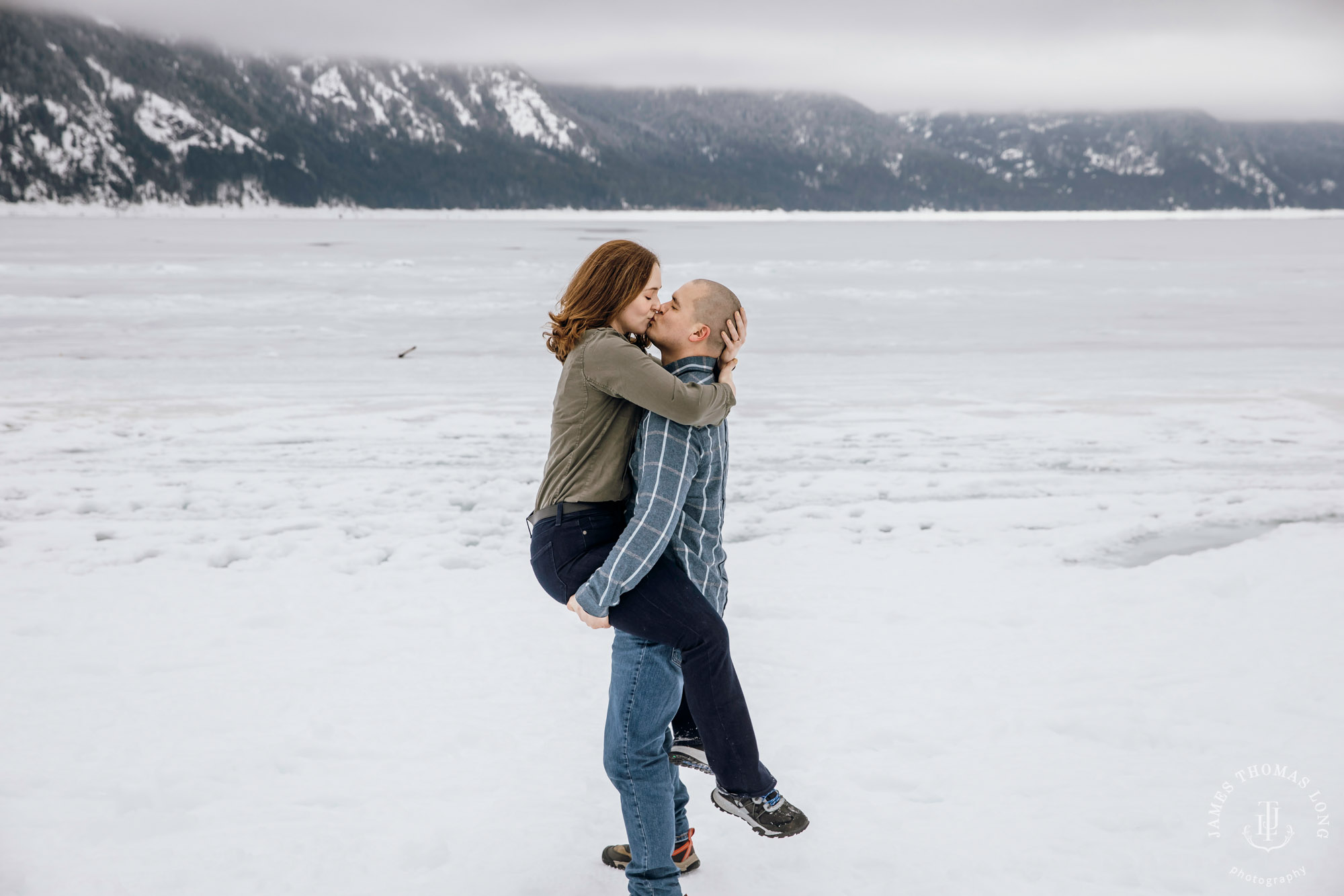 Cascade Mountain snowshoeing adventure engagement session in the snow by Snoqualmie wedding photographer James Thomas Long Photography