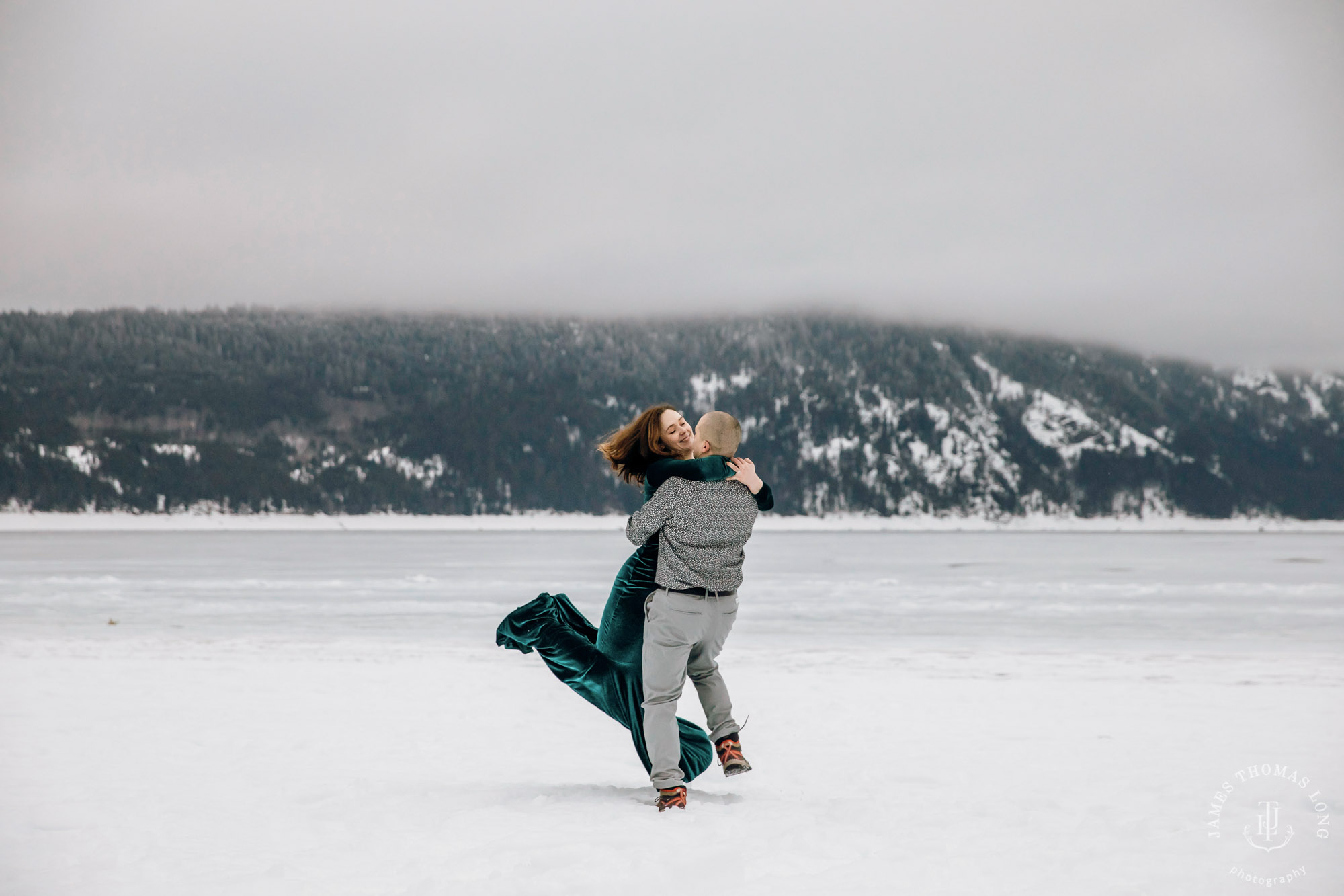 Cascade Mountain snowshoeing adventure engagement session in the snow by Snoqualmie wedding photographer James Thomas Long Photography