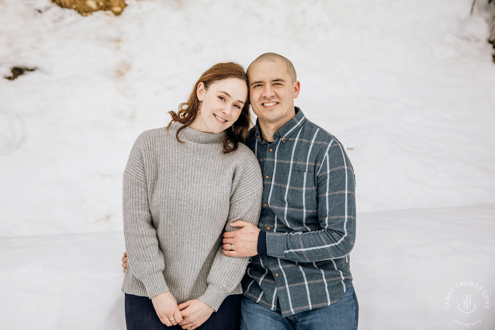 Cascade Mountain snowshoeing adventure engagement session in the snow by Snoqualmie wedding photographer James Thomas Long Photography