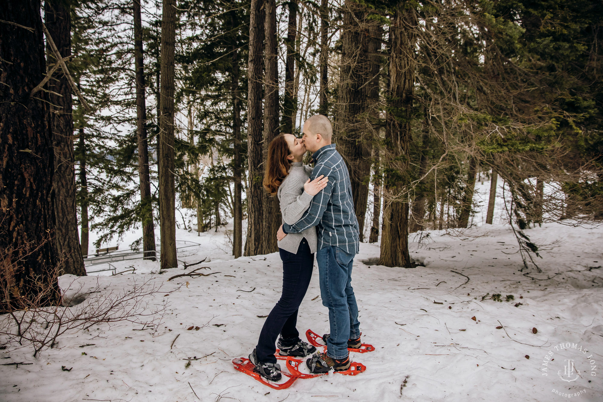 Cascade Mountain snowshoeing adventure engagement session in the snow by Snoqualmie wedding photographer James Thomas Long Photography