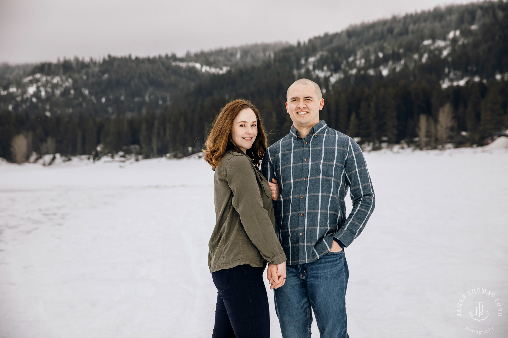 Cascade Mountain snowshoeing adventure engagement session in the snow by Snoqualmie wedding photographer James Thomas Long Photography