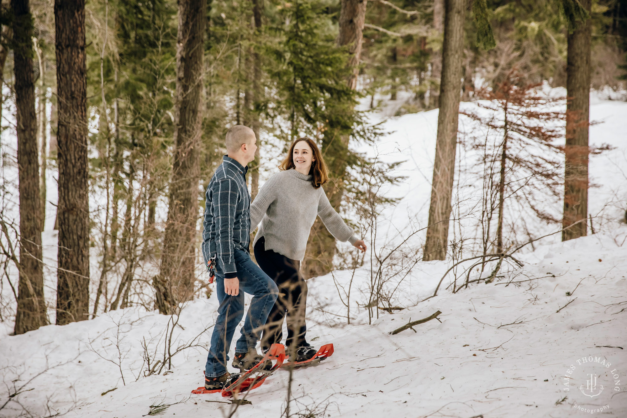 Cascade Mountain snowshoeing adventure engagement session in the snow by Snoqualmie wedding photographer James Thomas Long Photography