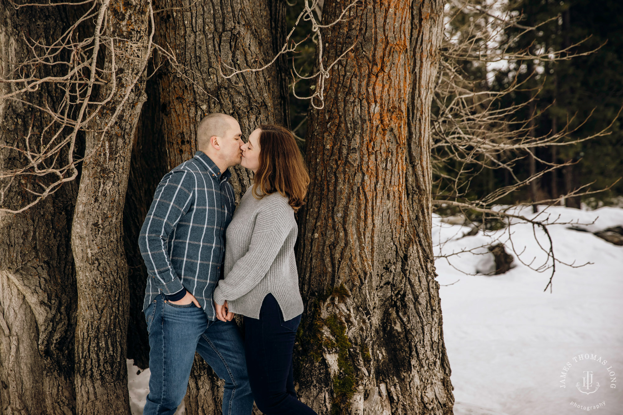 Cascade Mountain snowshoeing adventure engagement session in the snow by Snoqualmie wedding photographer James Thomas Long Photography