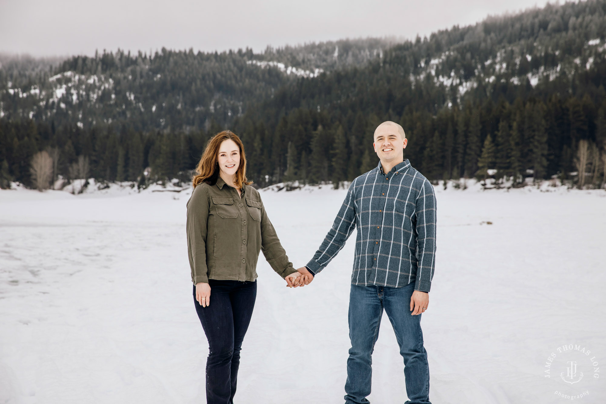 Cascade Mountain snowshoeing adventure engagement session in the snow by Snoqualmie wedding photographer James Thomas Long Photography