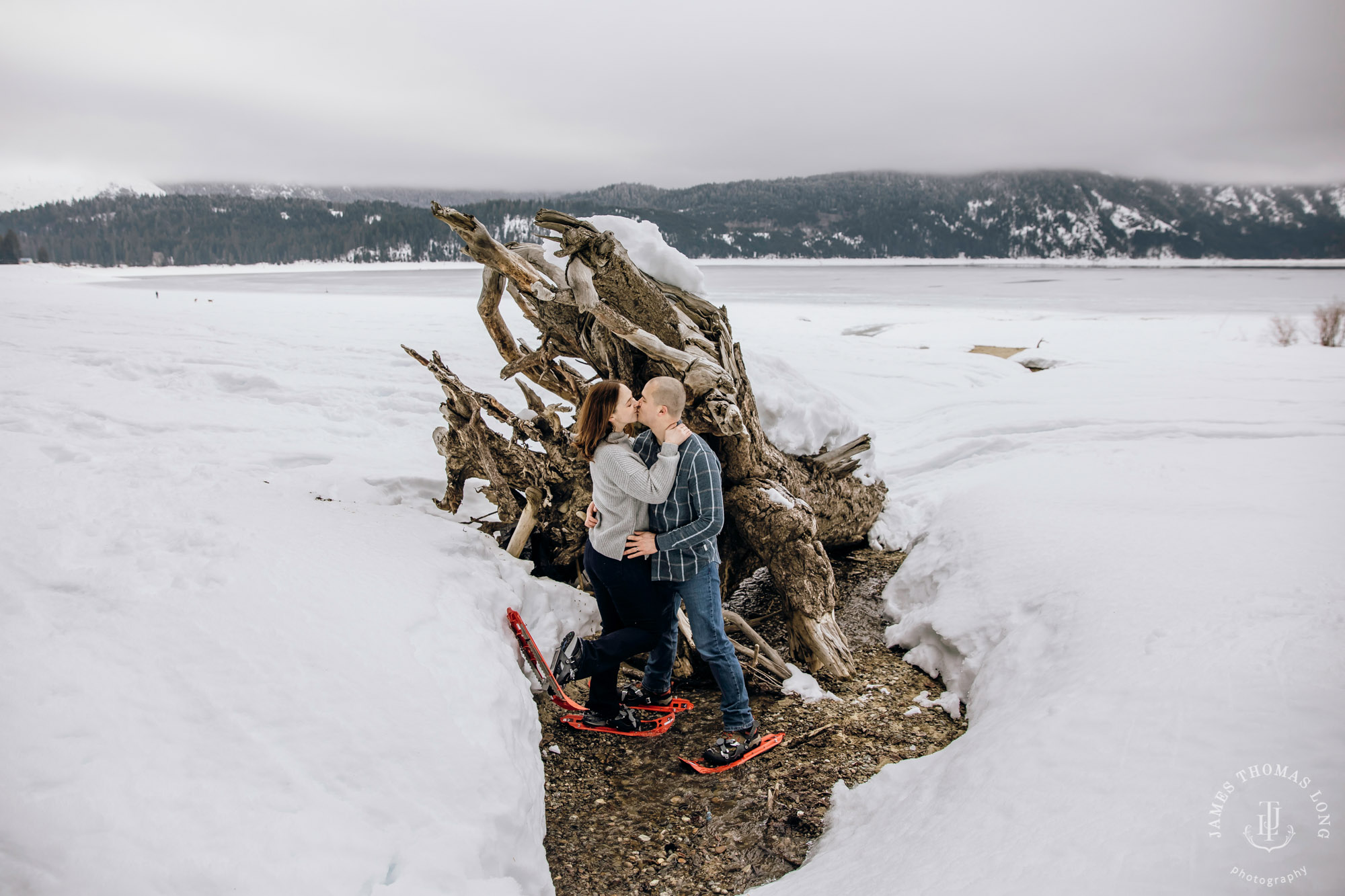 Cascade Mountain snowshoeing adventure engagement session in the snow by Snoqualmie wedding photographer James Thomas Long Photography