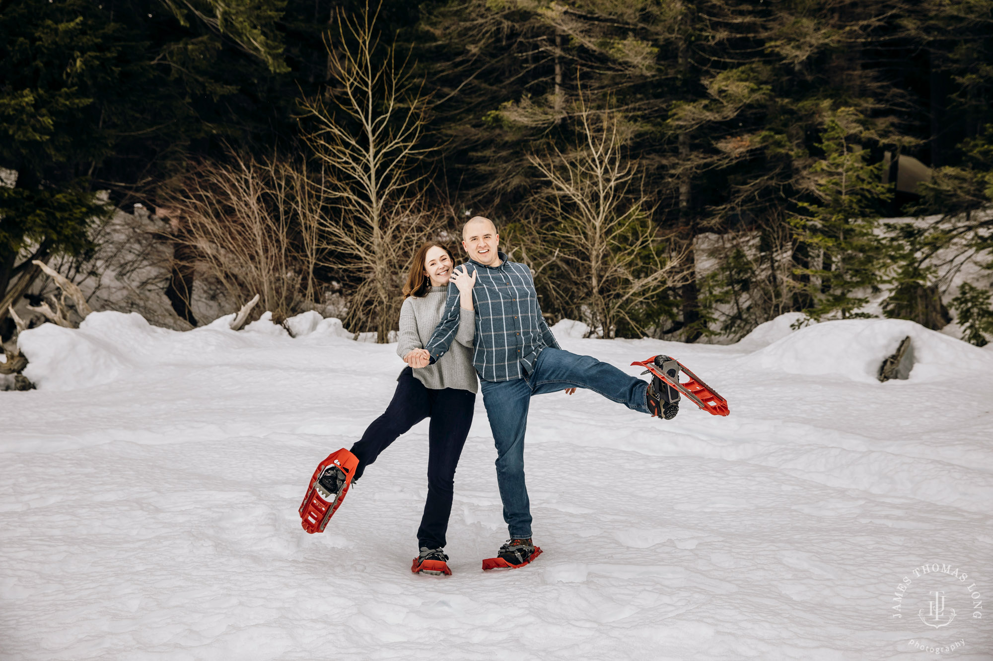 Cascade Mountain snowshoeing adventure engagement session in the snow by Snoqualmie wedding photographer James Thomas Long Photography