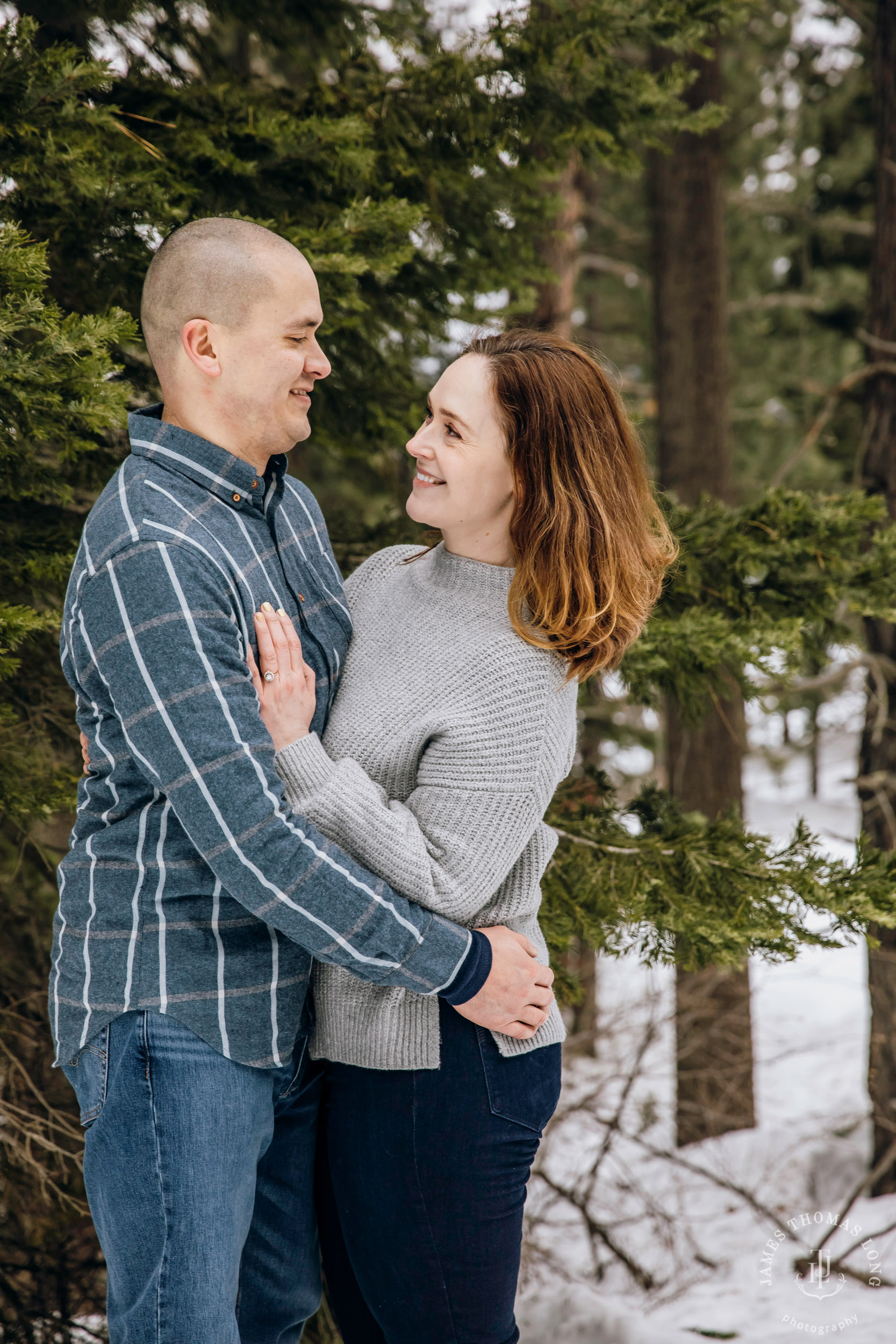 Cascade Mountain snowshoeing adventure engagement session in the snow by Snoqualmie wedding photographer James Thomas Long Photography