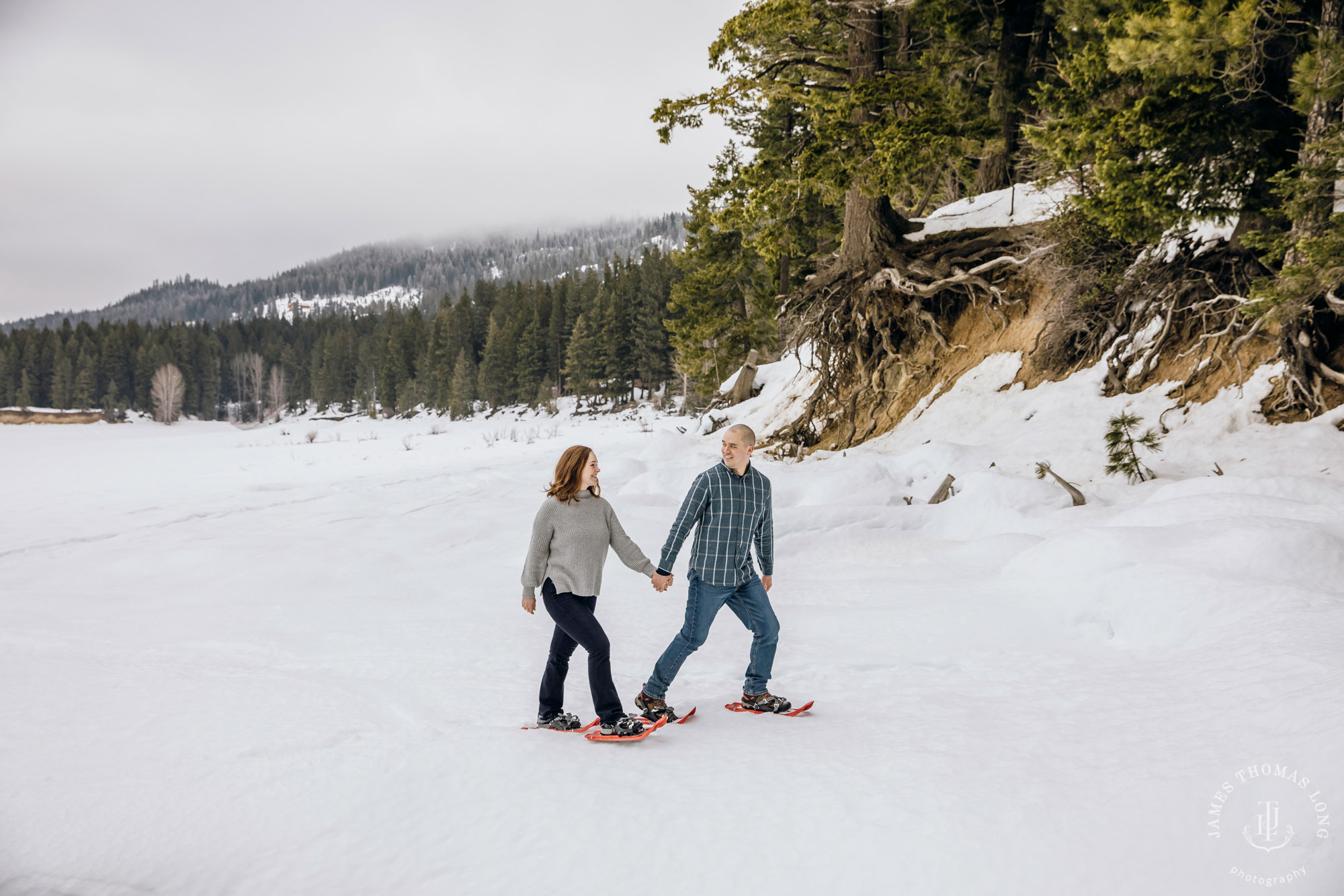 Cascade Mountain snowshoeing adventure engagement session in the snow by Snoqualmie wedding photographer James Thomas Long Photography