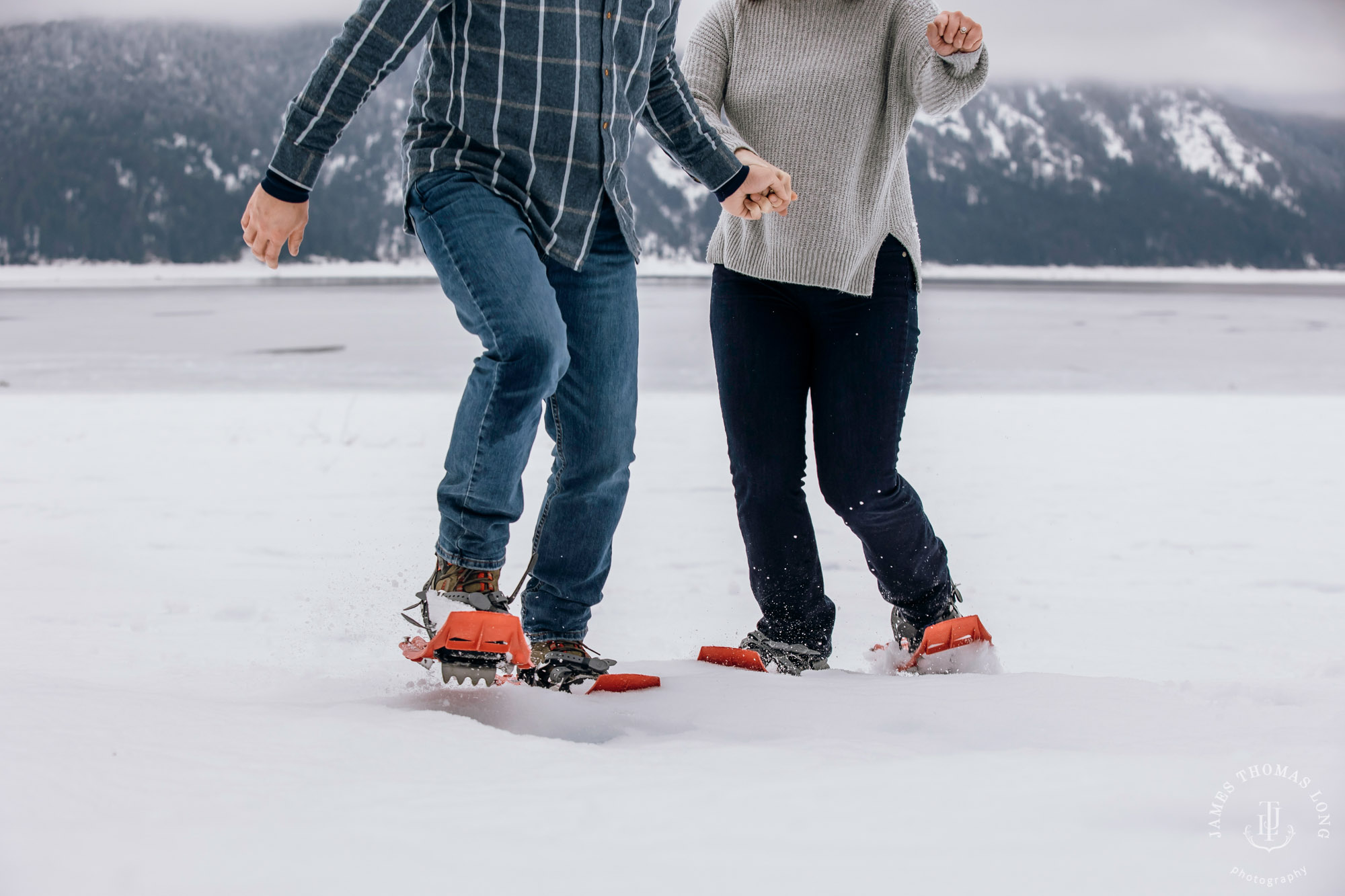 Cascade Mountain snowshoeing adventure engagement session in the snow by Snoqualmie wedding photographer James Thomas Long Photography