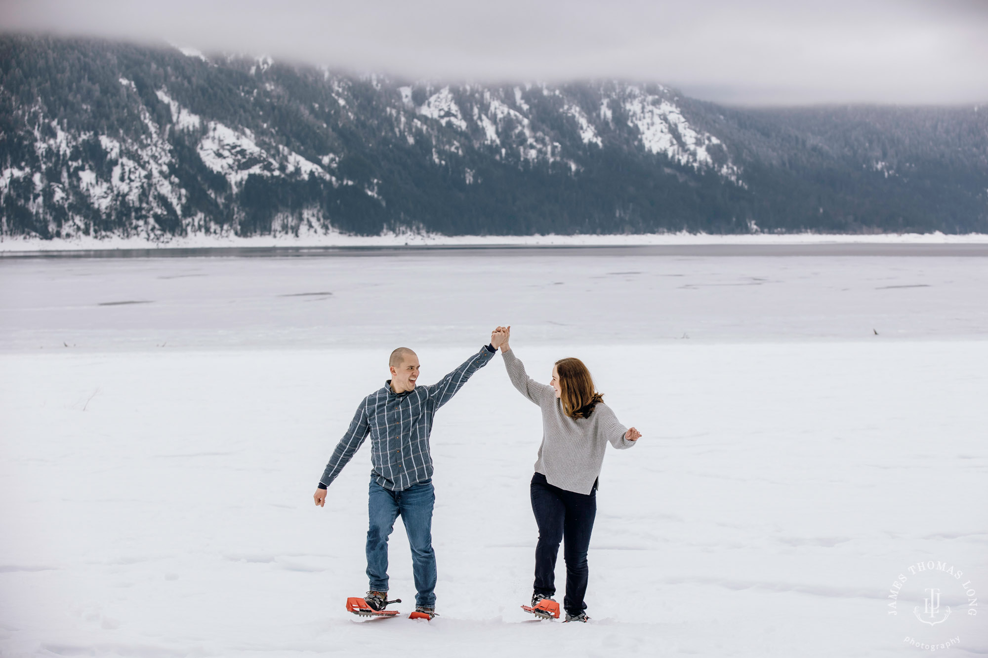 Cascade Mountain snowshoeing adventure engagement session in the snow by Snoqualmie wedding photographer James Thomas Long Photography