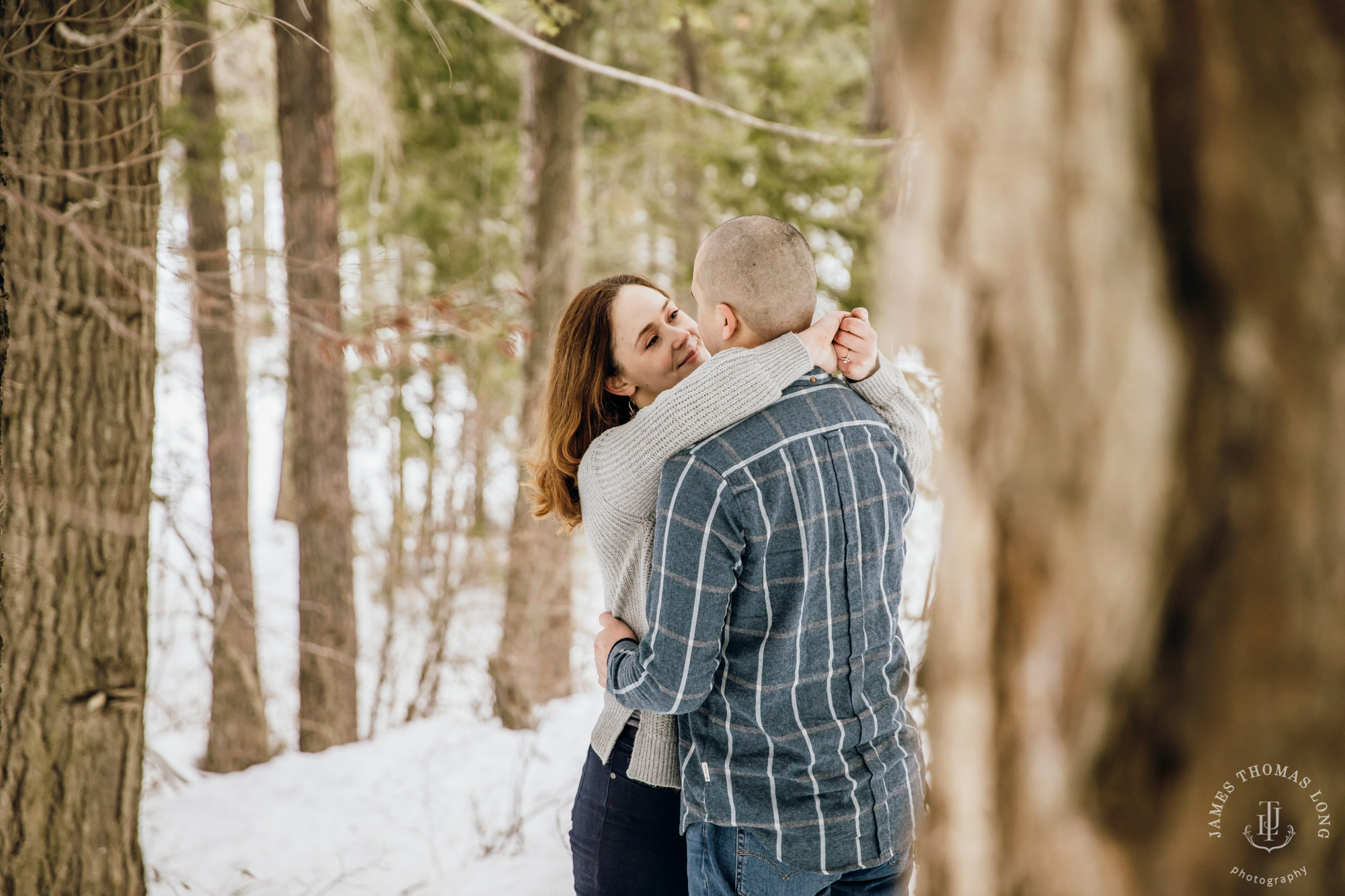 Cascade Mountain snowshoeing adventure engagement session in the snow by Snoqualmie wedding photographer James Thomas Long Photography