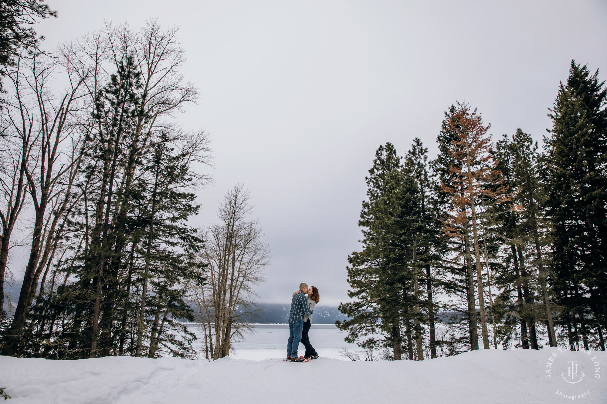 Cascade Mountain snowshoeing adventure engagement session in the snow by Snoqualmie wedding photographer James Thomas Long Photography