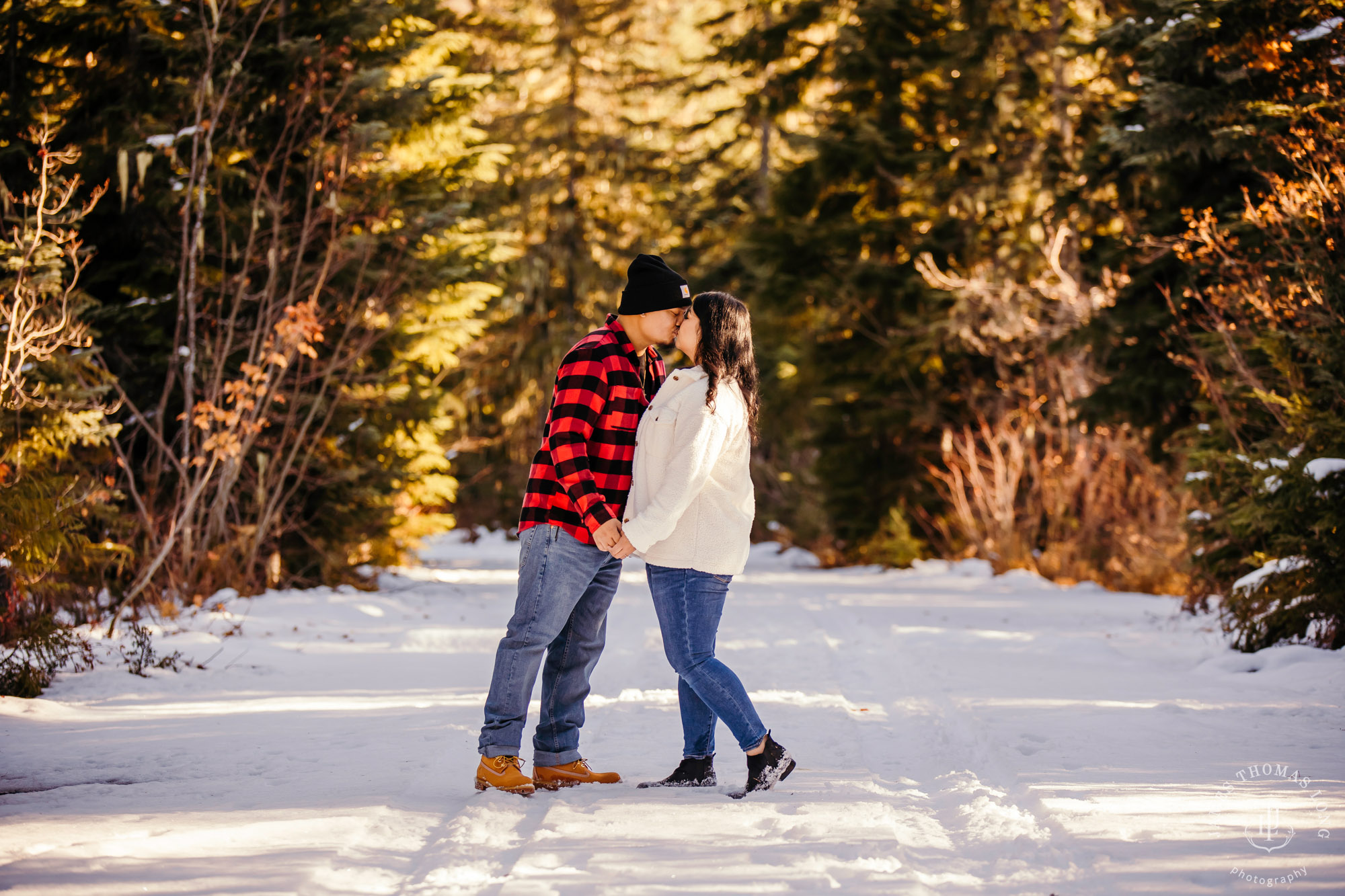 Adventure engagement session in the snow by Seattle adventure wedding photographer James Thomas Long Photography